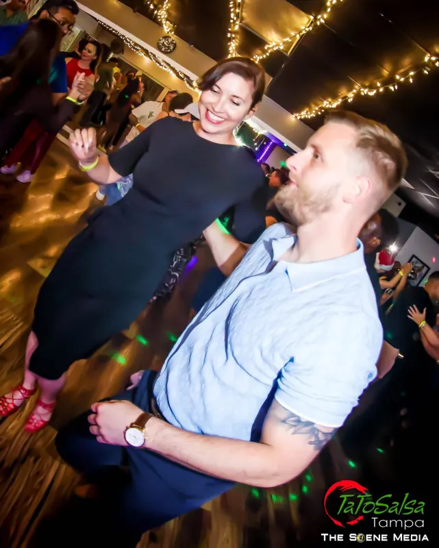 A couple dancing at a Tato Salsa social